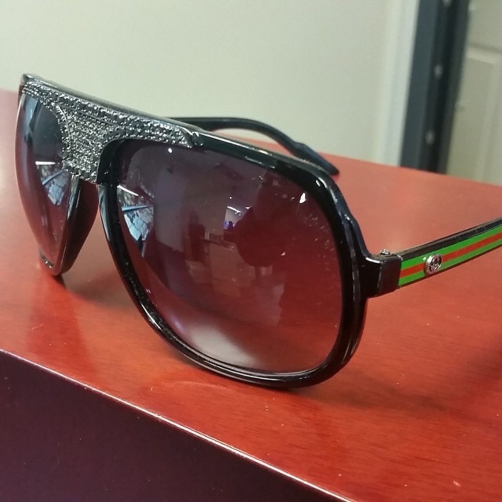 Authentic Gucci Shades with .5 ct real diamonds.